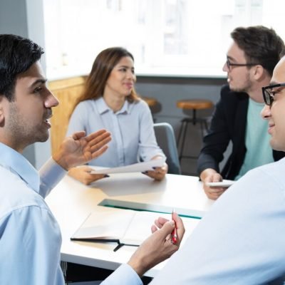 business-partners-discussing-deal_1262-16120