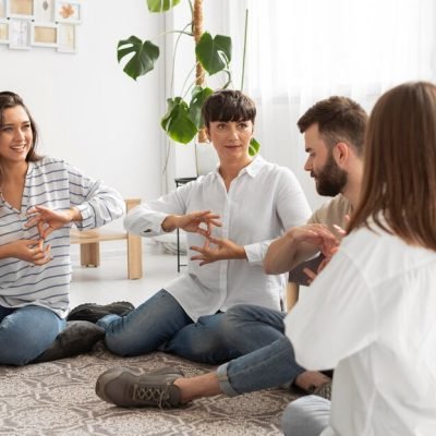 group-deaf-people-communicating-through-sign-language_23-2148719675