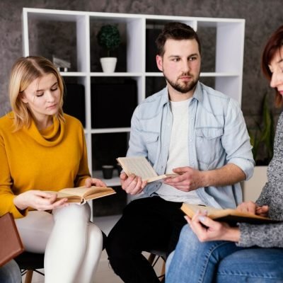 group-people-reading-books-therapy-session_23-2148856223